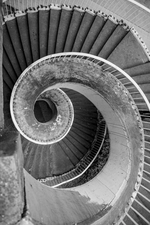 a spiral staircase is seen from above