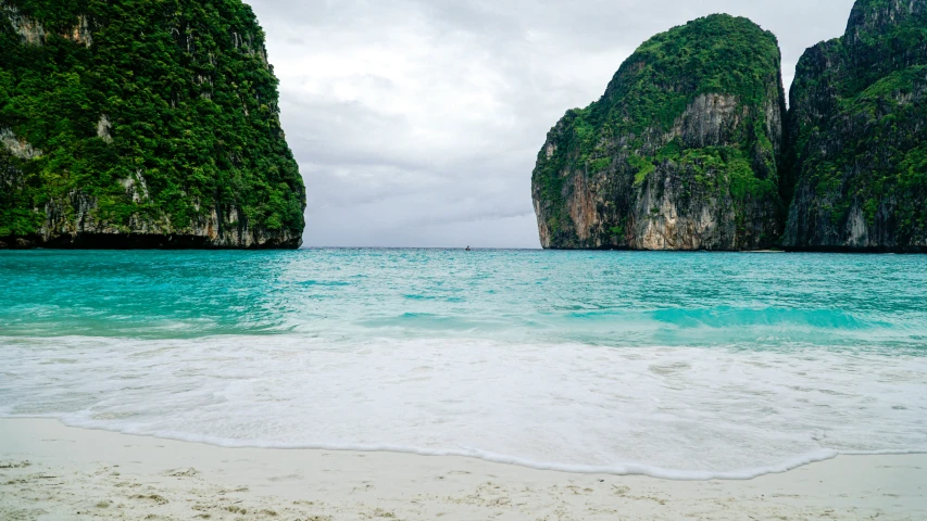 a view of the water and sand on a beach