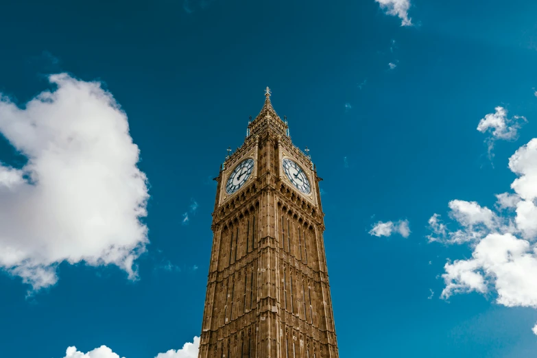 a large tall tower that has a clock on each side