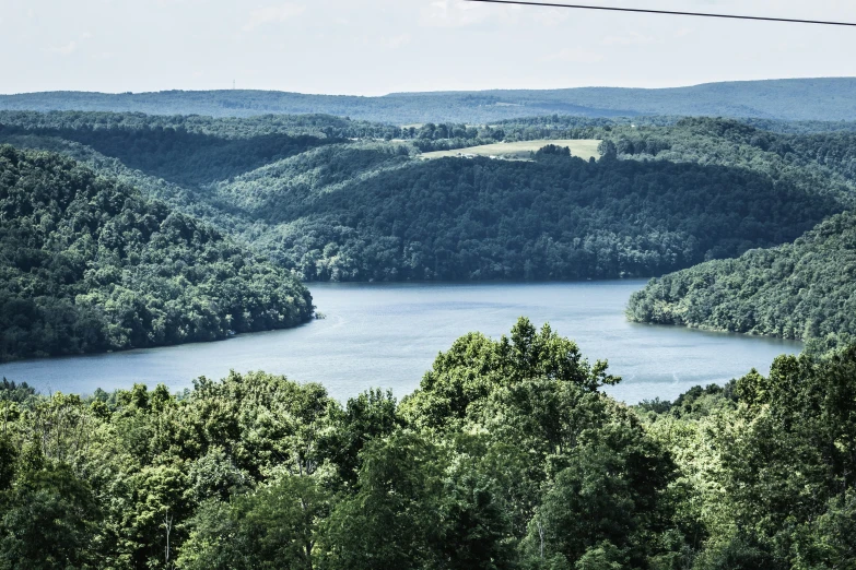 a view of the lake and mountains as seen from a distance