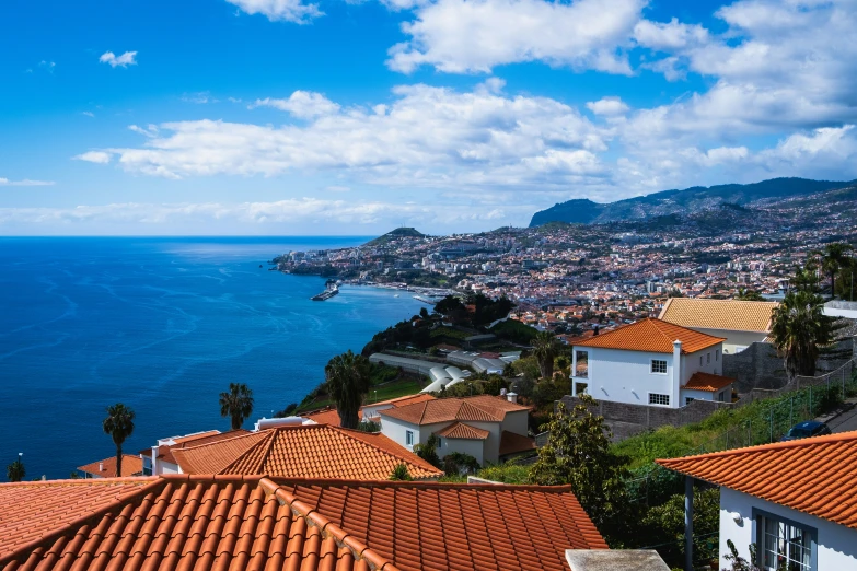 an old mediterranean style house sits near the ocean