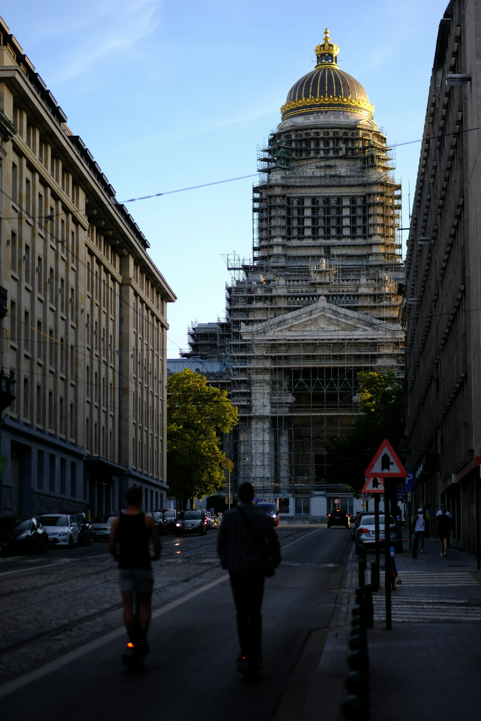 a church that is being renovated over by scaffolding