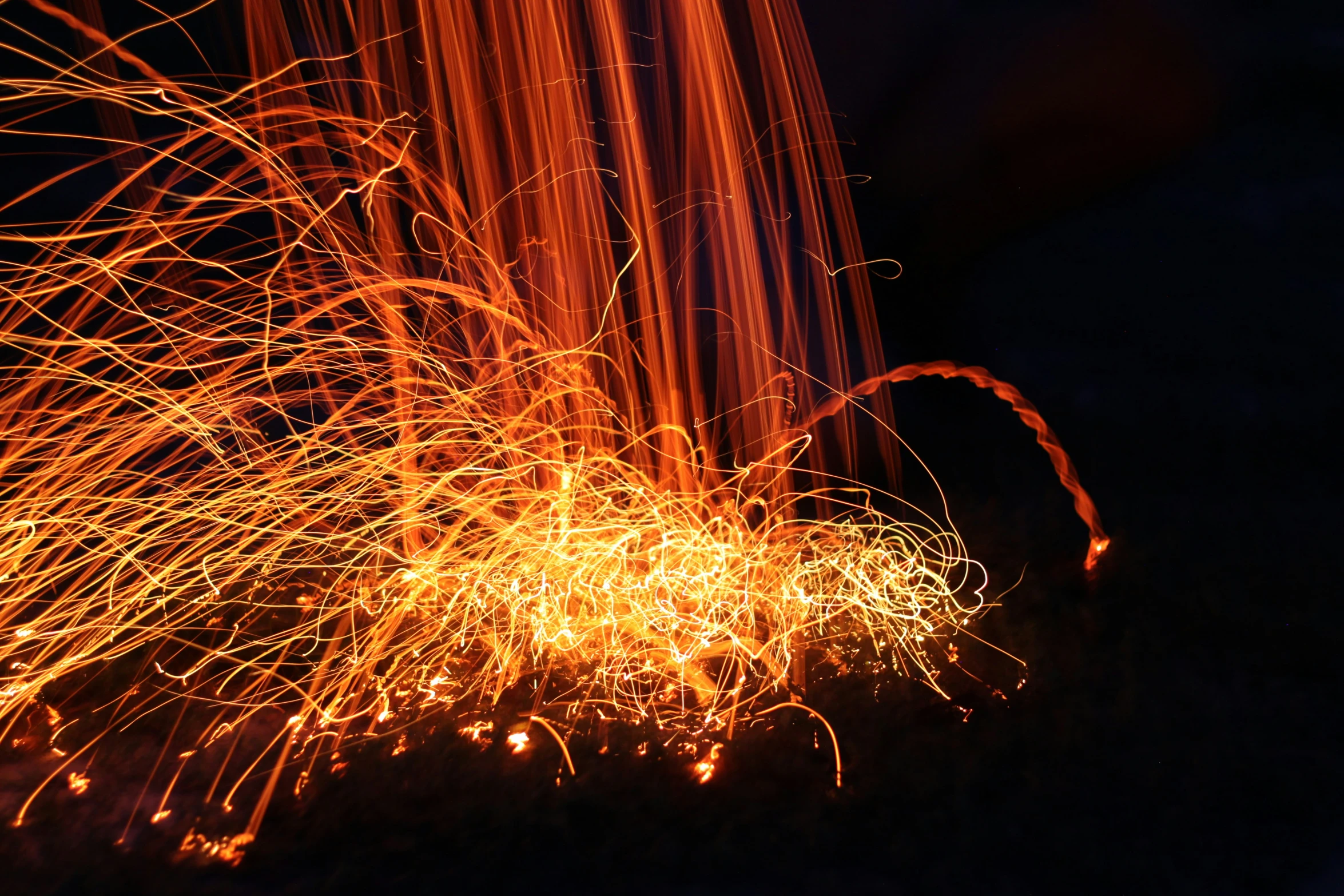 an image of fireworks at night that are lit up