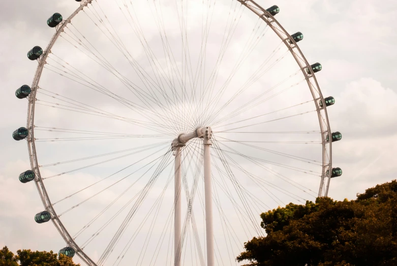 a big wheel that is standing up in the sky