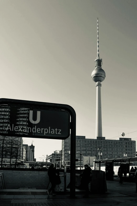 the view of a large television tower from the city