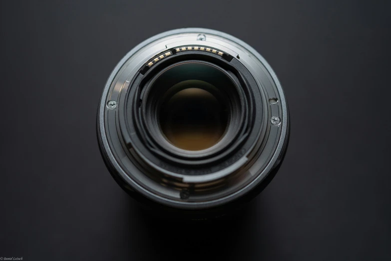 a camera lens with the top portion facing upwards