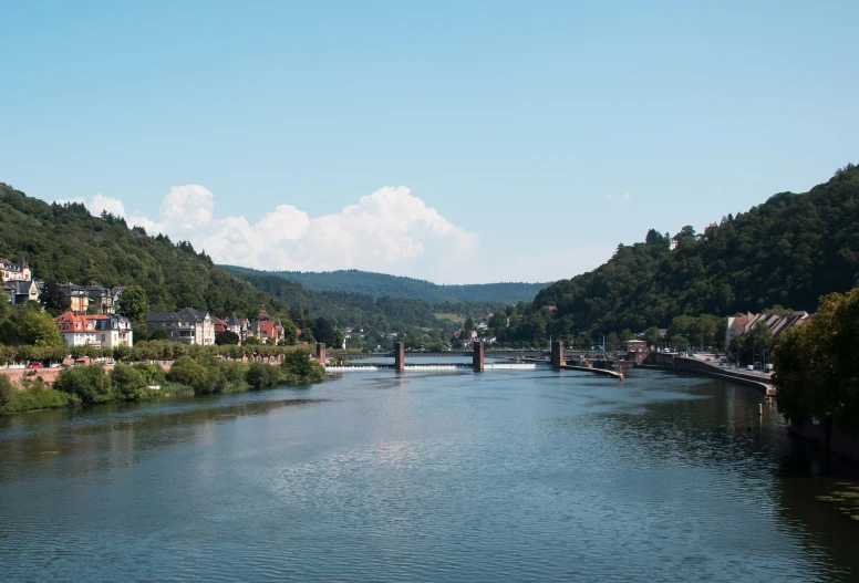 boats going on the river near small town