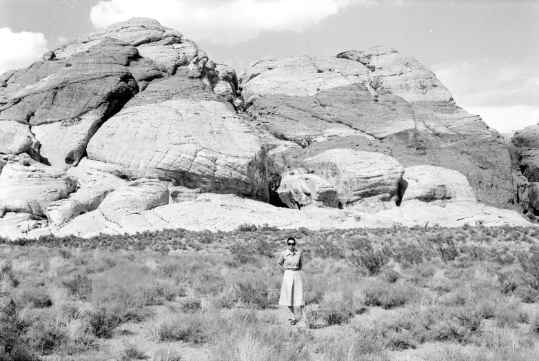 a person is walking through a desert area