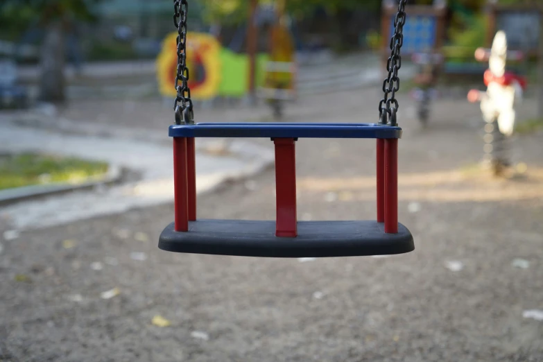 a swing on a play area near the playground