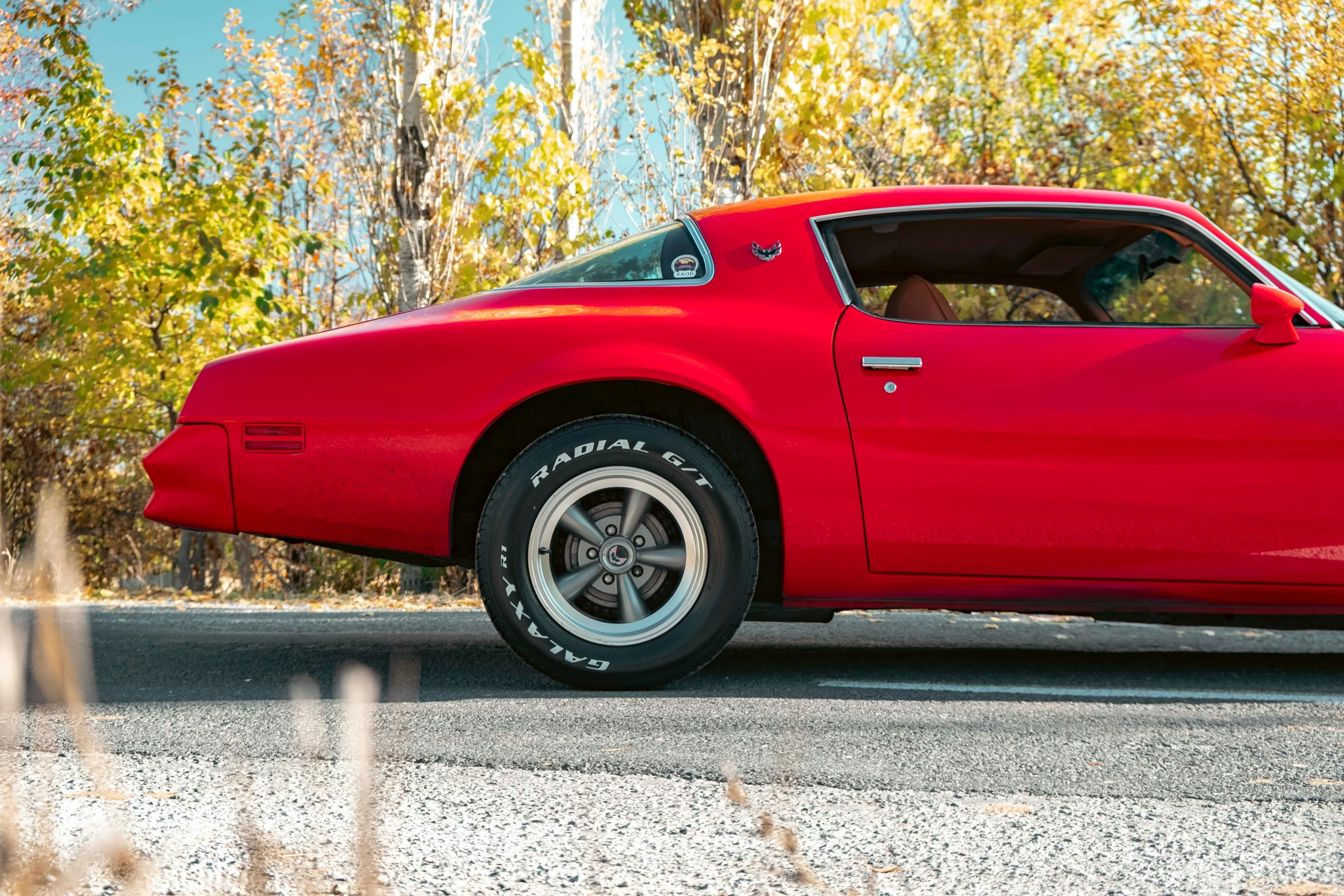 a red sports car parked on the street