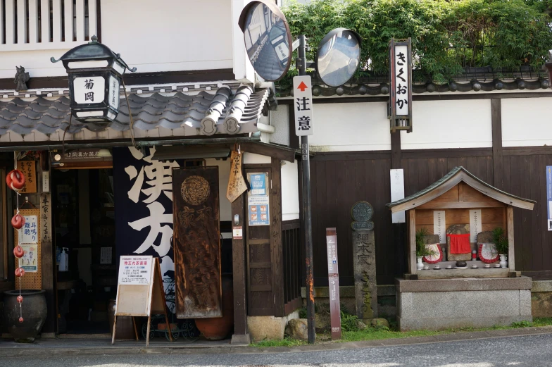 a small store with a large amount of asian characters on it