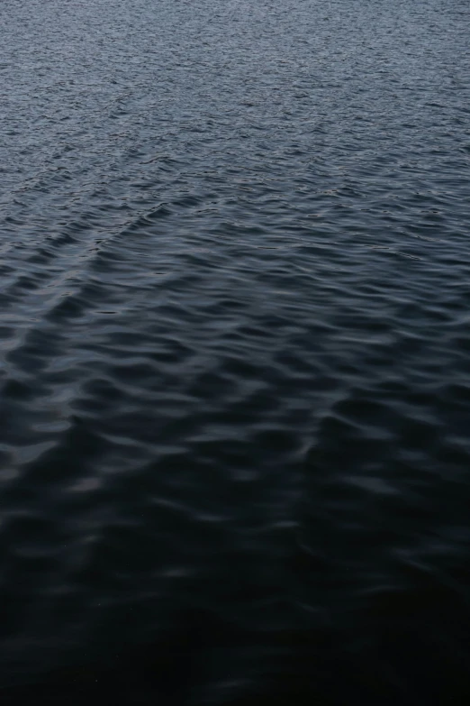 a boat is in the middle of a body of water