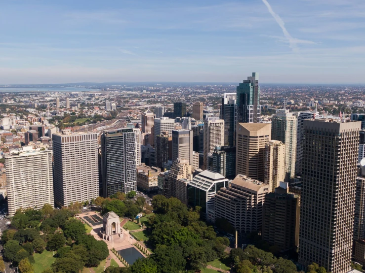 an aerial view of several tall buildings in the city