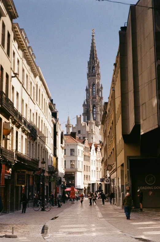 many people walk in the middle of an empty street