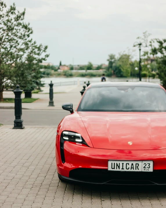 a red sports car parked on the street