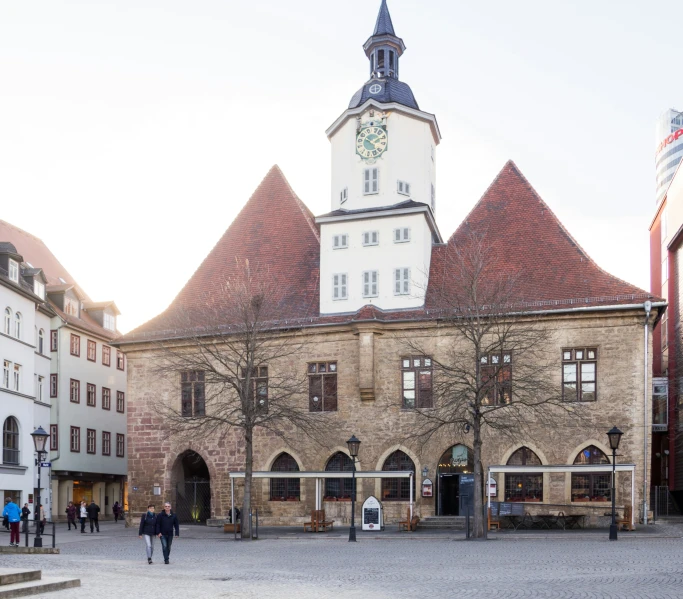 a tall brick building with a clock tower