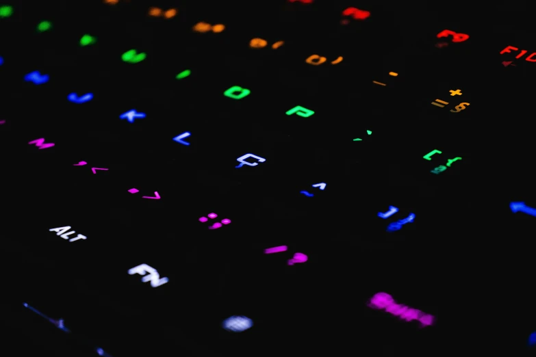 a glowing keyboard is pictured in this black background