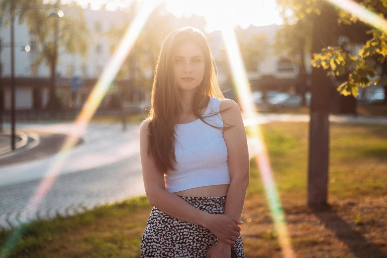 a beautiful young lady posing for a picture