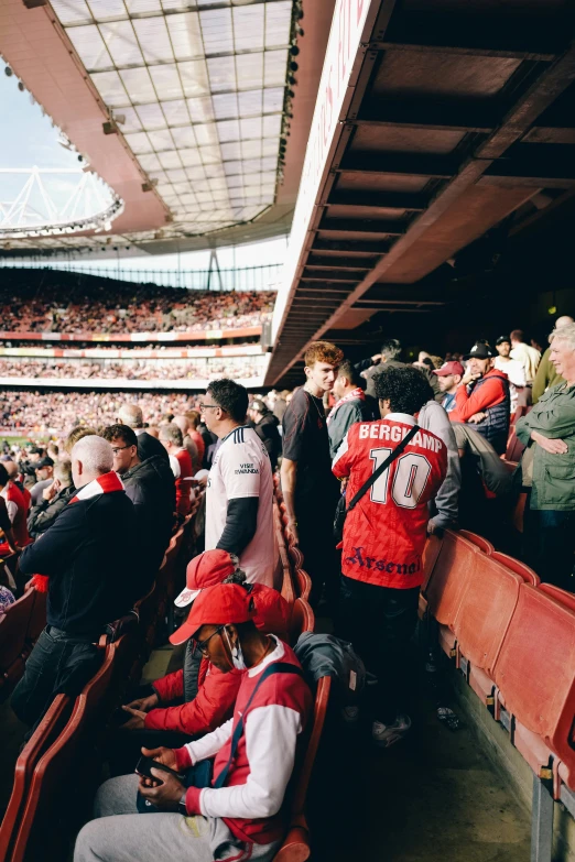 an image of people in the stadium watching soing