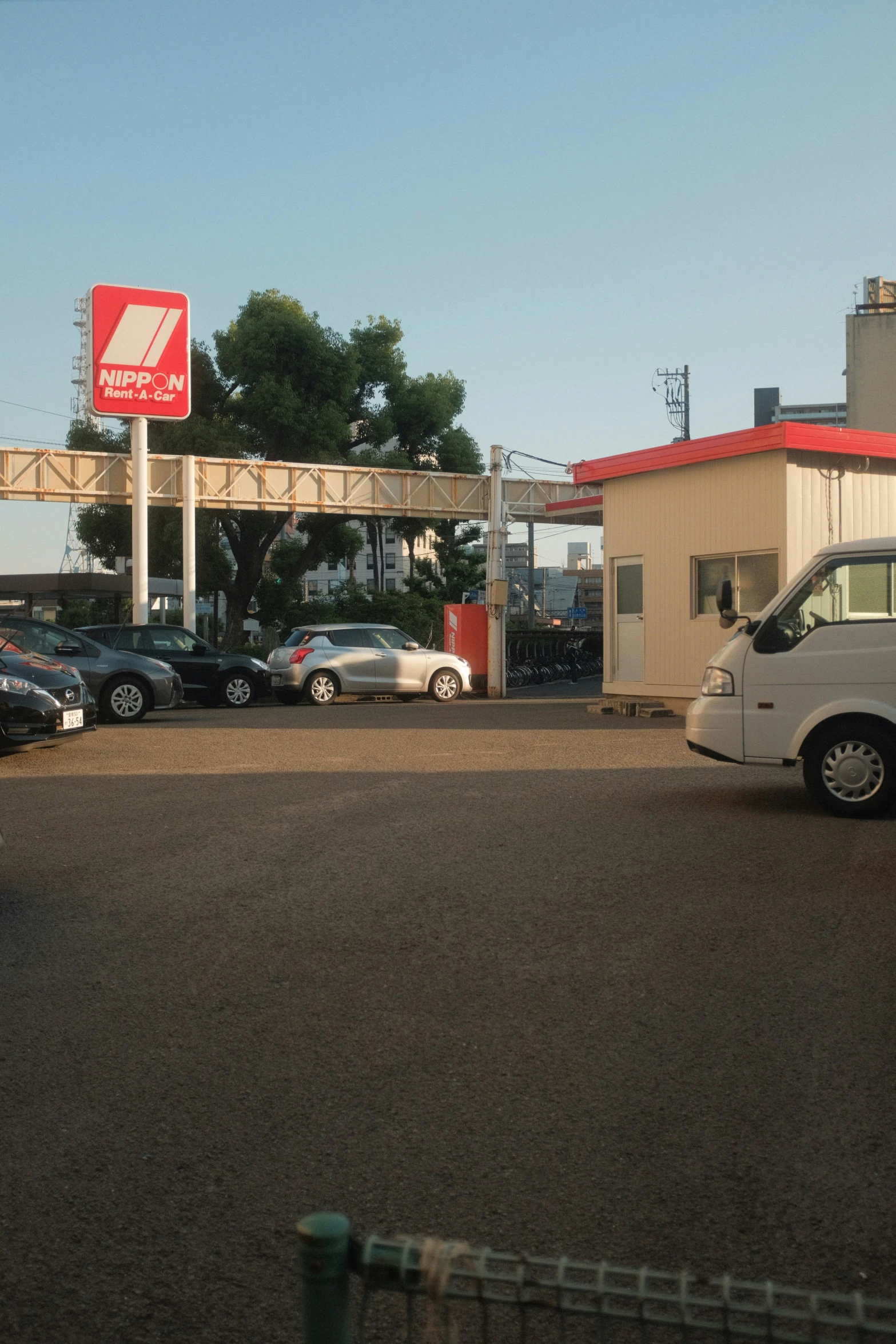 there are many cars outside the business parking lot