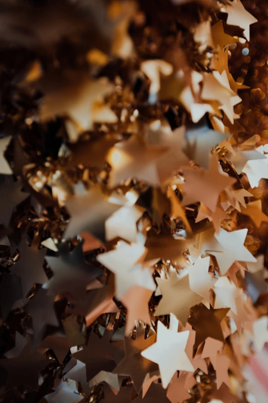 a close up of many shiny stars as seen from below