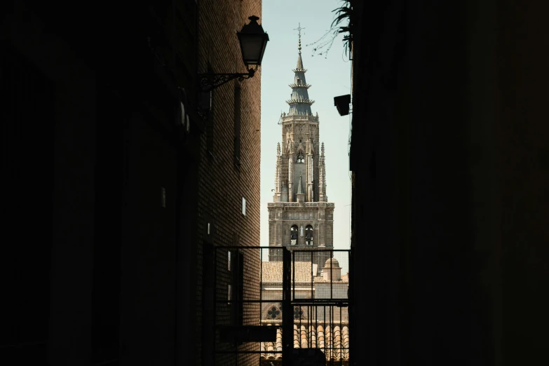 a clock tower towering over another big city