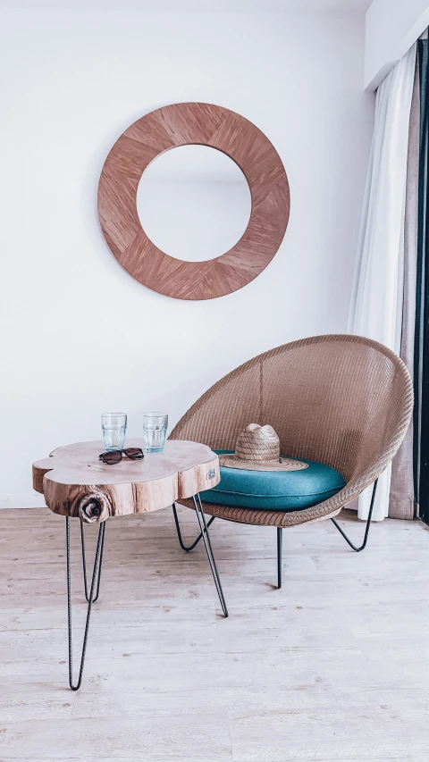 the chair and the table are near a circular object