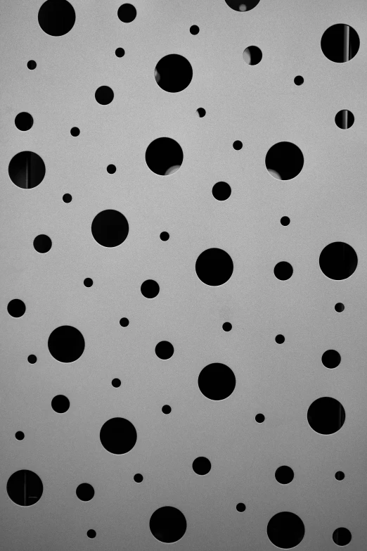 several pieces of paper with a pattern of small circles on them