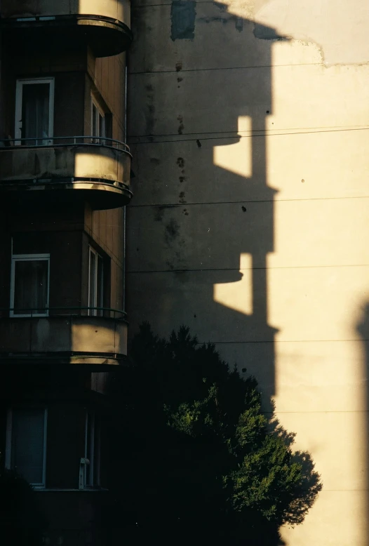 building shadow of a traffic light against a building