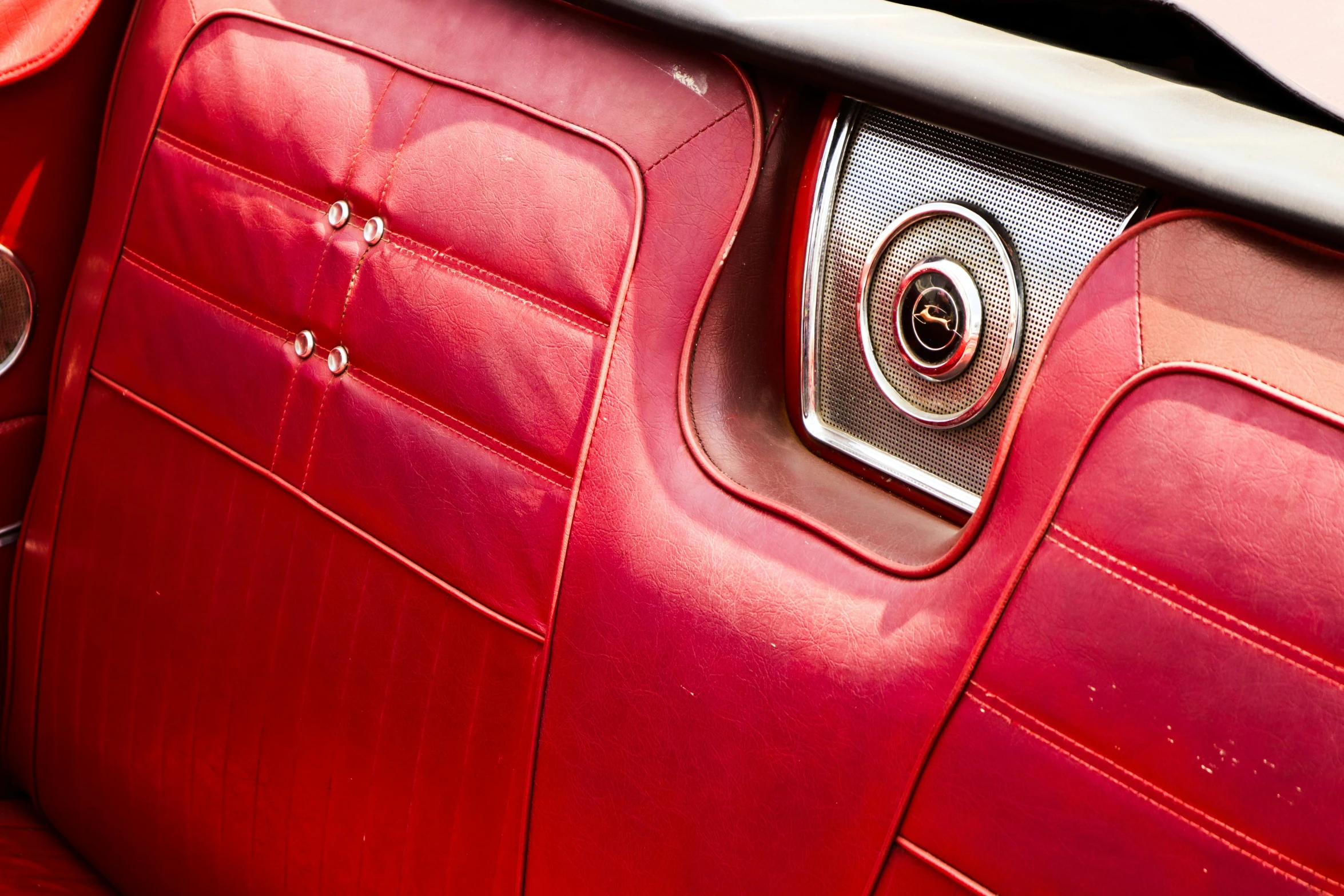 the interior and front bumpers of an old fashion car