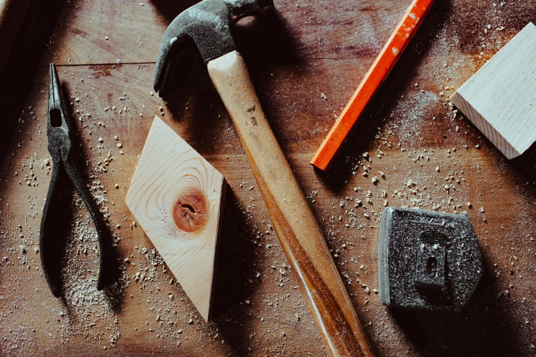 the various tools are resting on the workbench