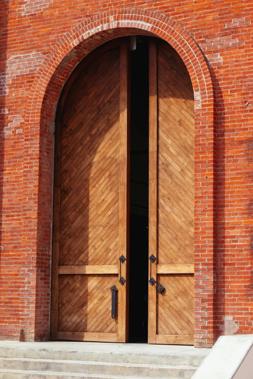 a very big wooden door that is open