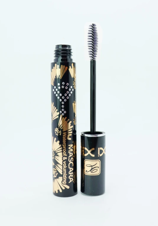 a black and white mascara on a white background