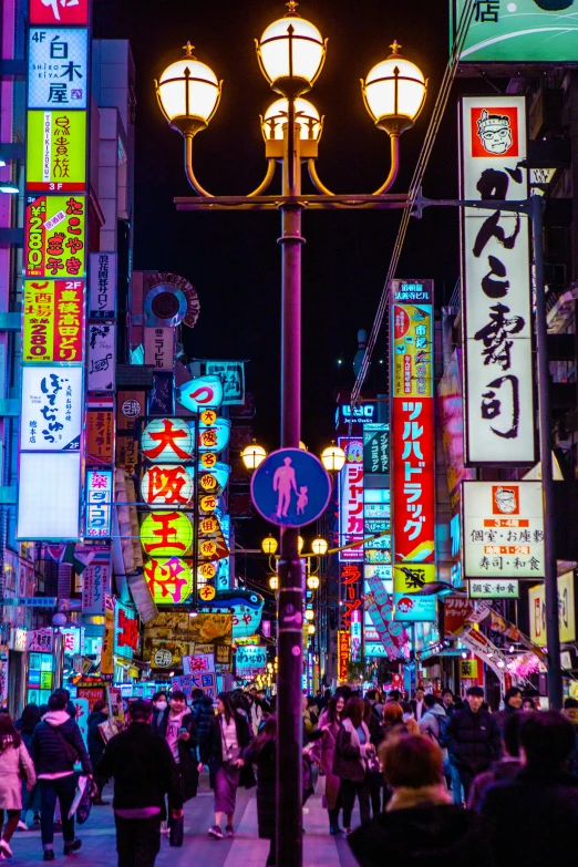 a street with various different colored signs on it