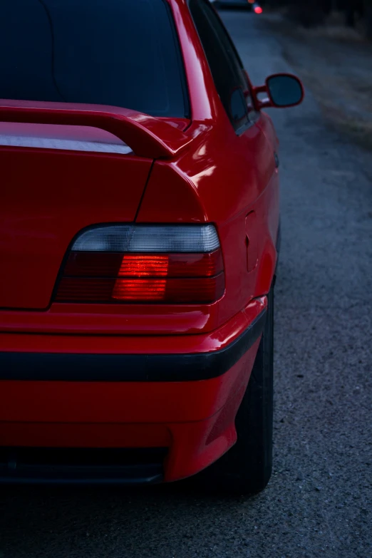 a close - up po of a car taillight and tail
