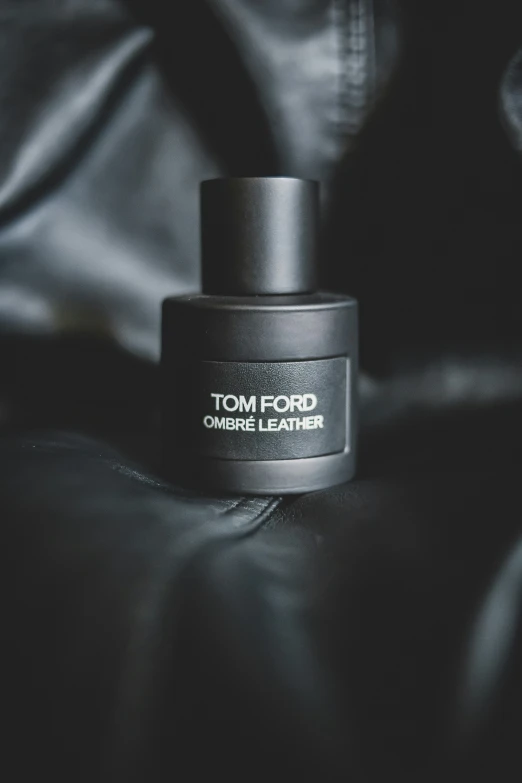 tom ford perfume bottle on a black silk background