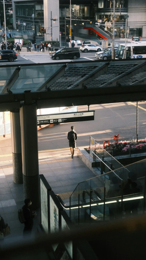 a person is walking on a street at night