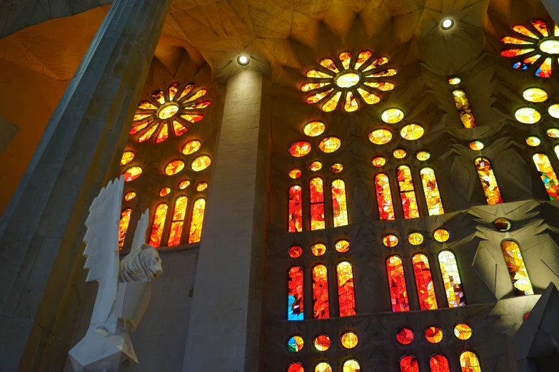 the inside view of an elaborate cathedral with windows