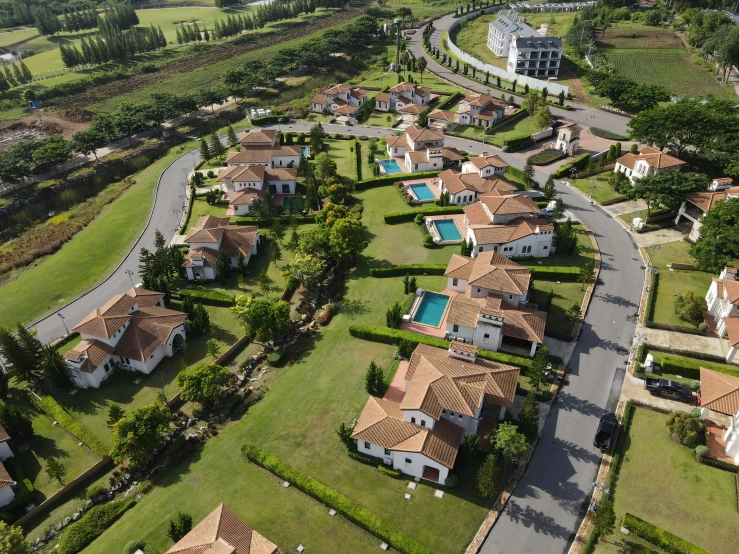 a bird - eye view of some homes in a large field