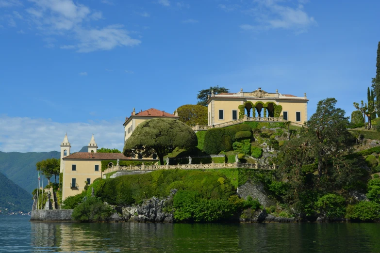 a big house sitting on top of a hill