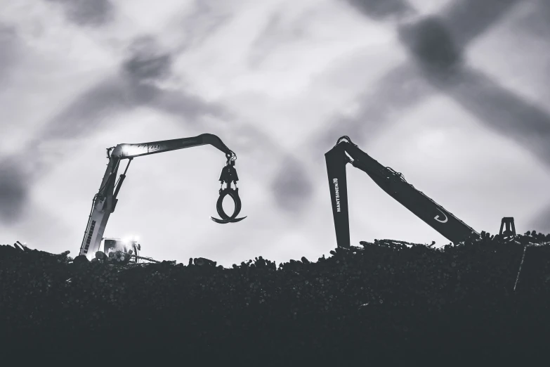 an array of machinery with sky and clouds behind