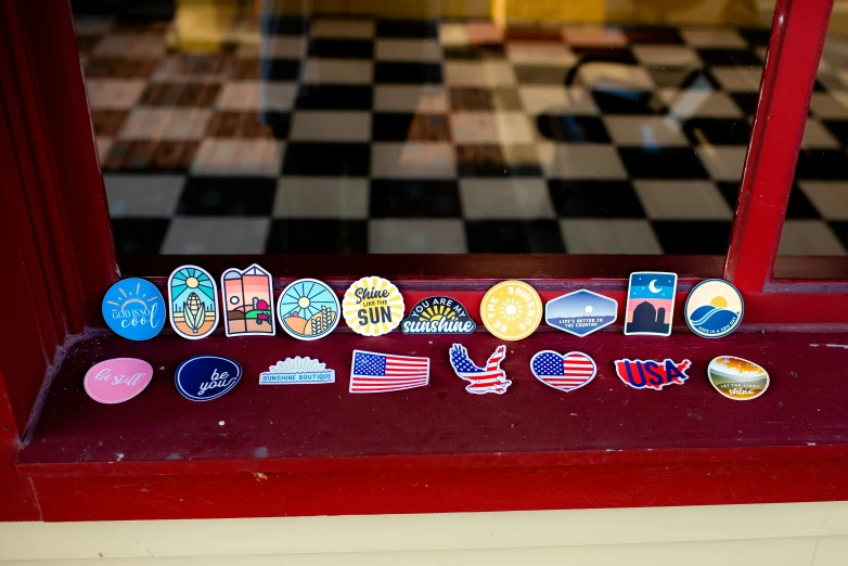 a display case holds badges and pin backs