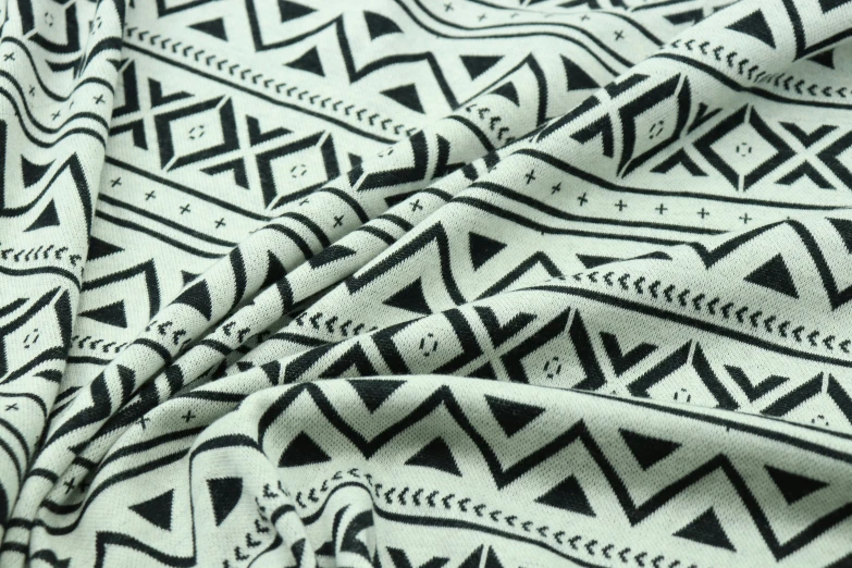 an african blanket with designs that appear to be on a cloth