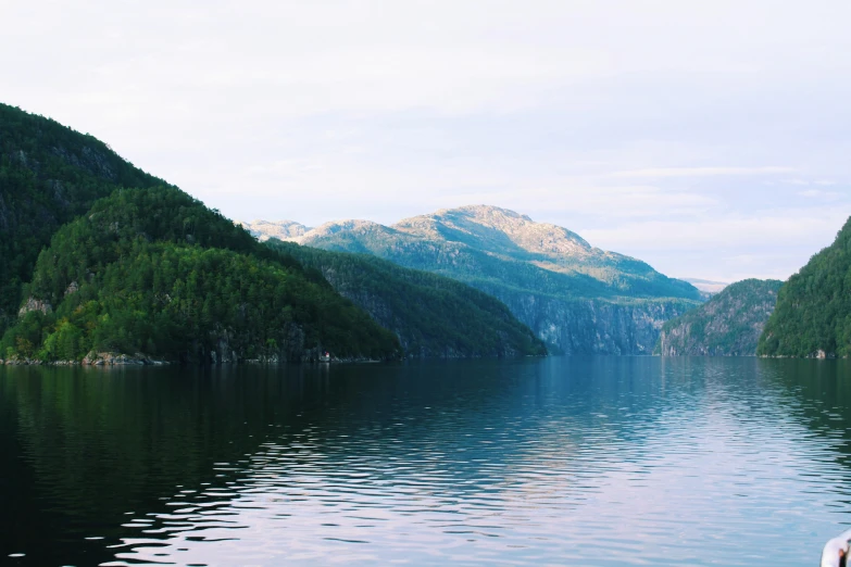 view of mountains and waters near a forest