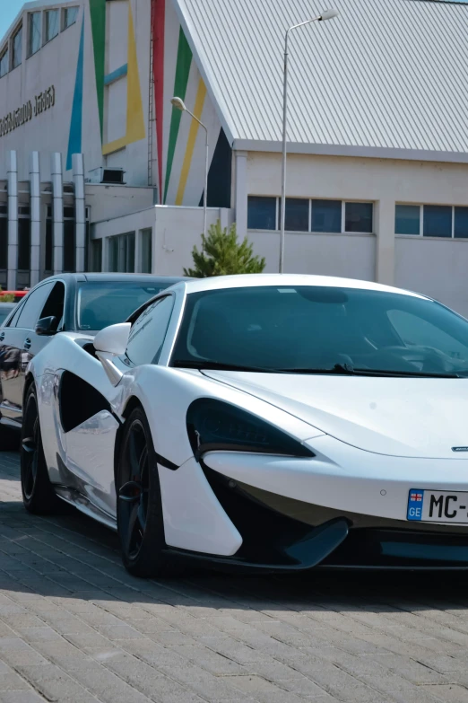 a very nice looking white and black sports car