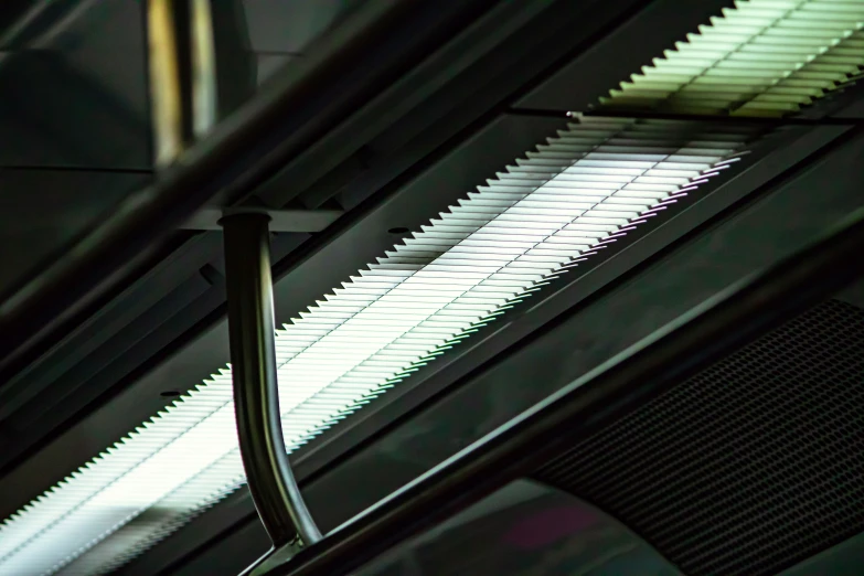 an airplane ceiling with light from inside and shadows coming from its sides