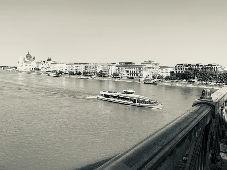 the view from a bridge of a city and the river