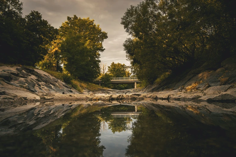 a picture of the water reflecting it in a park