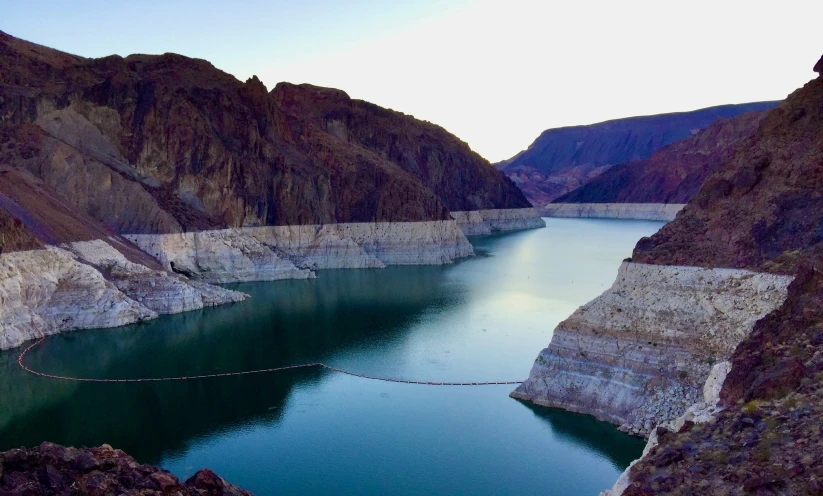 the green water inside of a deep gorge