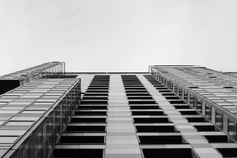 a tall building with many windows on the side